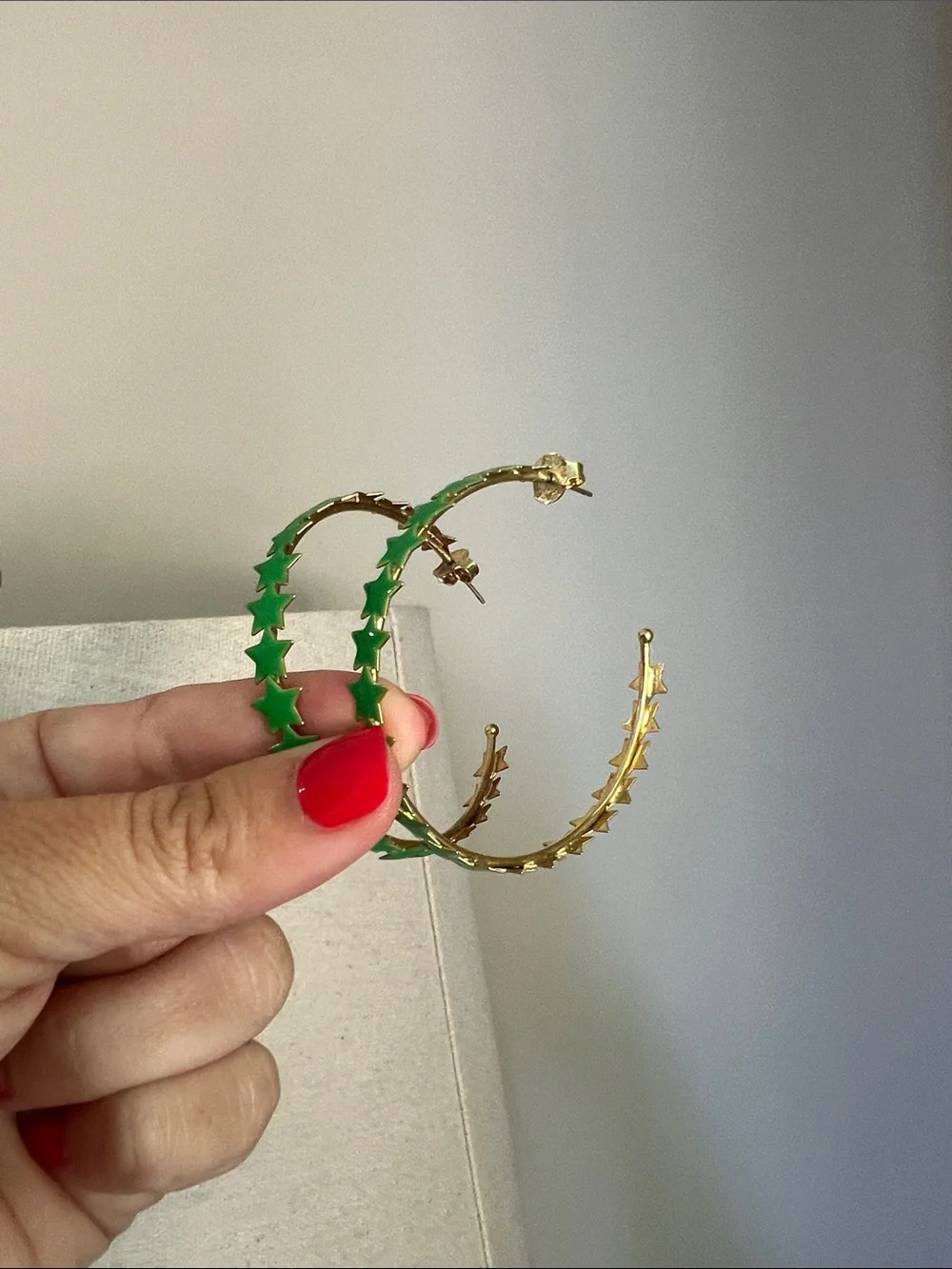 Sheila Fajl 2 inch Gold Hoop Earrings with Green Star Accents
